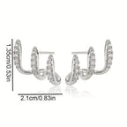 Pendientes con circonita en engaste de tres garras