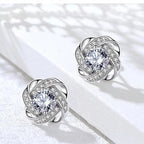 Pendientes dorados en espiral floral con cristales