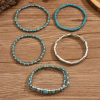 Conjunto de pulseras boho con perlas turquesas
